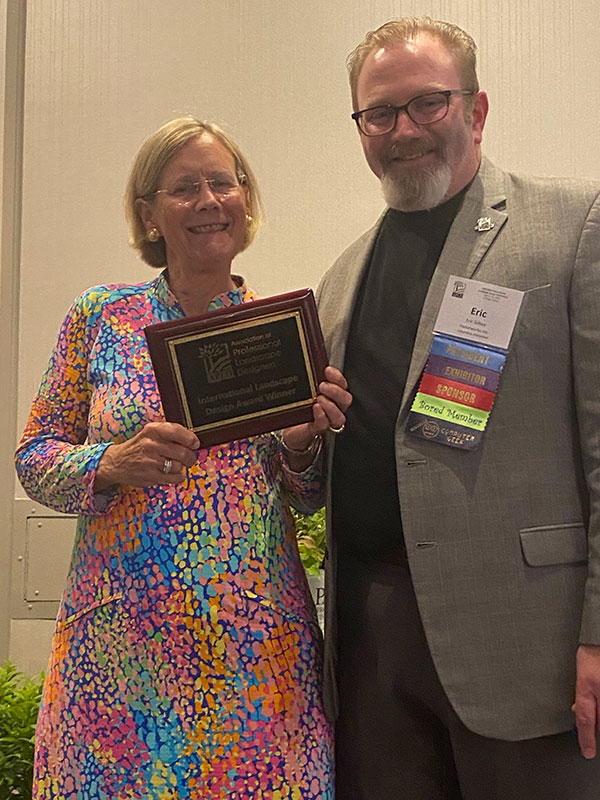 Mary Palmer Dargan, RLA of Dargan Landscape Architects receives an International GOLD Landscape Design Award from Eric Gilbey of Vectorworks, President of The Association of Professional Landscape Designers at the July conference in Chicago, IL.